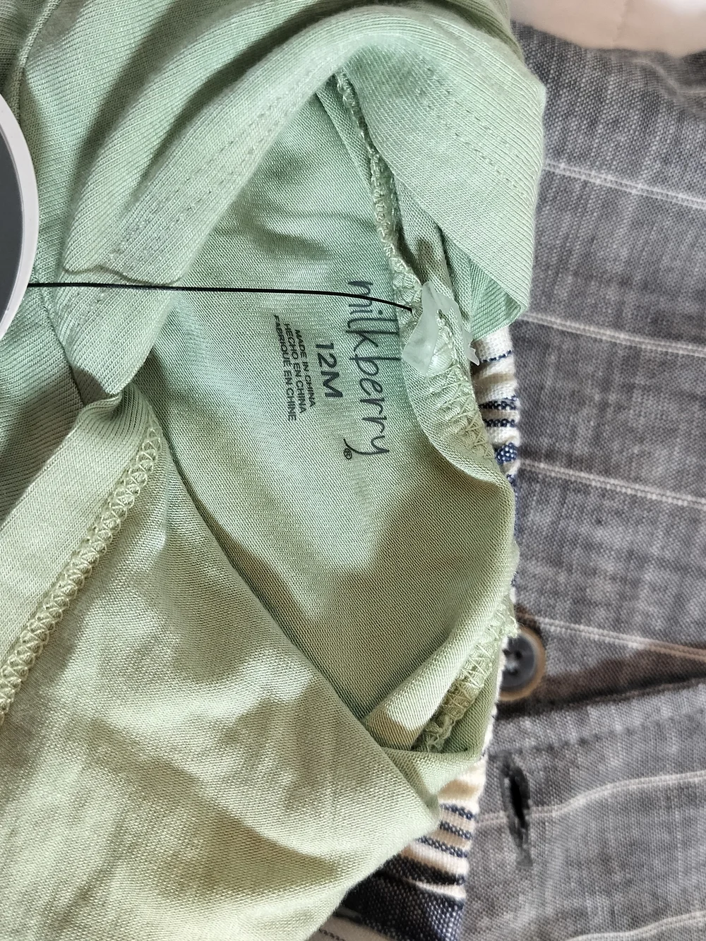 Green Hooded Top and Striped Shorts